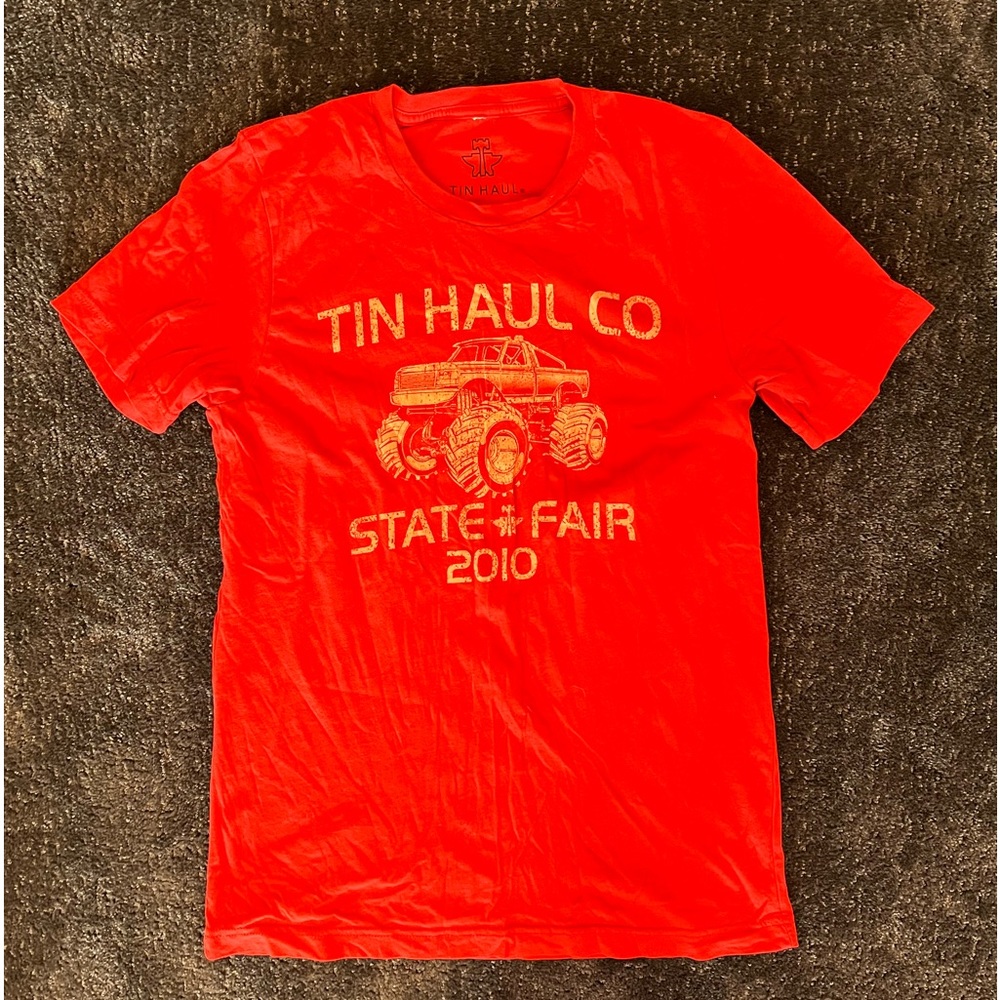 Men’s red Tin Haul tee shirt in size small